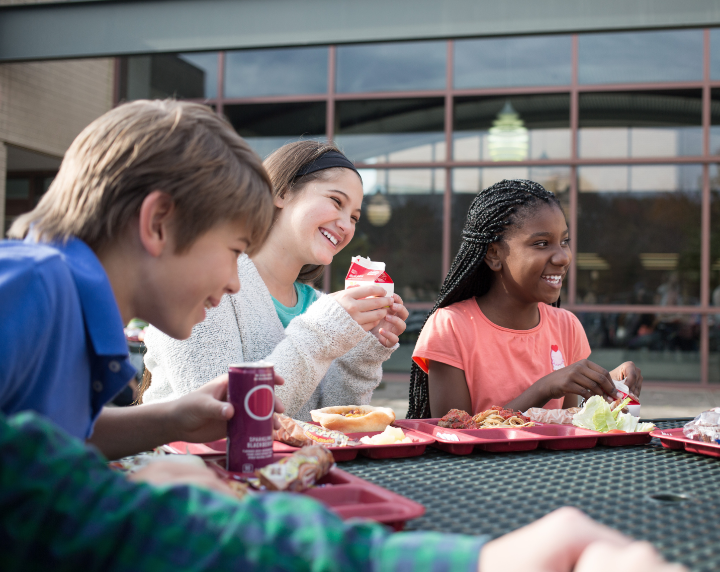Students at a lunch table. 